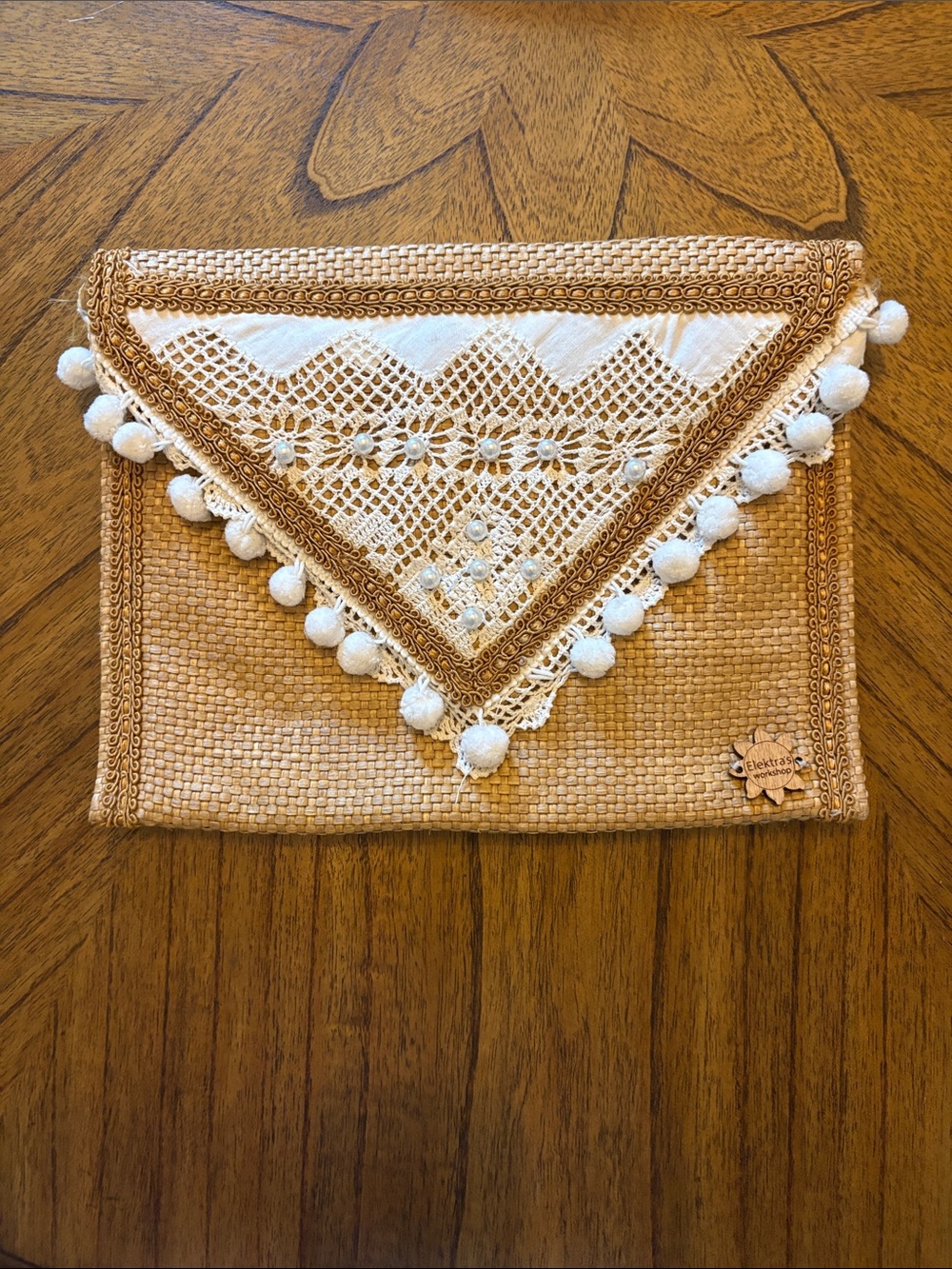 Woven Straw Clutch with White Lace Pom Trim - handmade from Greece.
